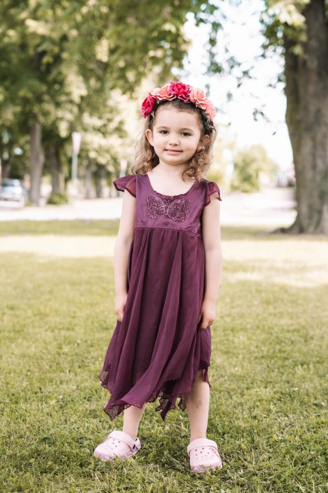 Fuchsiové šatičky s motýlkem